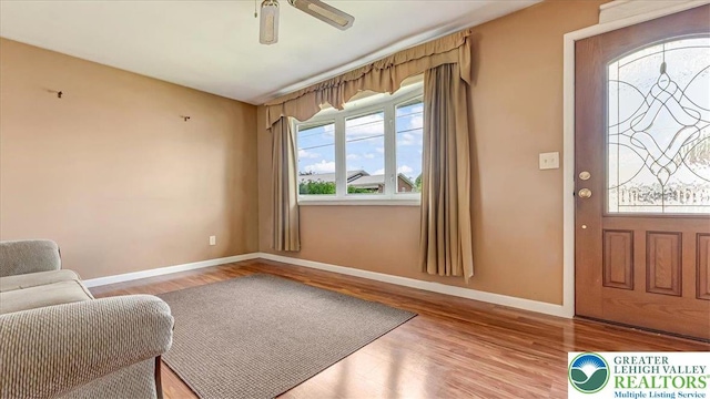 2934 Keystone St, Bethlehem Twp, PA 18020 - entrance foyer with ceiling fan, baseboards, and wood finished floors