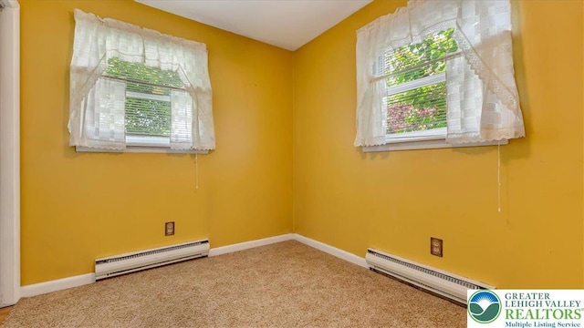 2934 Keystone St, Bethlehem Twp, PA 18020 - spare room featuring baseboard heating, carpet floors, and baseboards