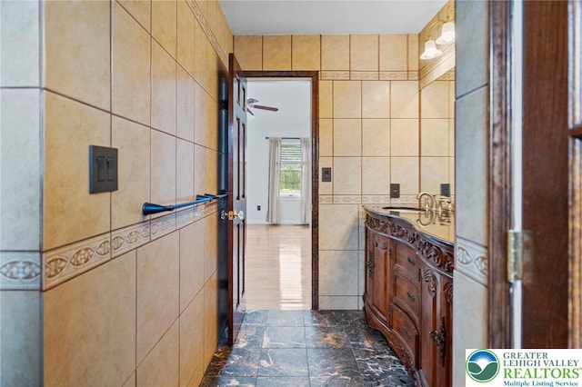 5753 Shady Ln, Plainfield Twp, PA 18064 - bathroom with tile walls and vanity