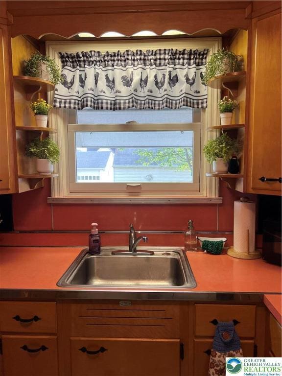 1540 Riegel St, Hellertown Borough, PA 18055 - kitchen with open shelves, a sink, and light countertops