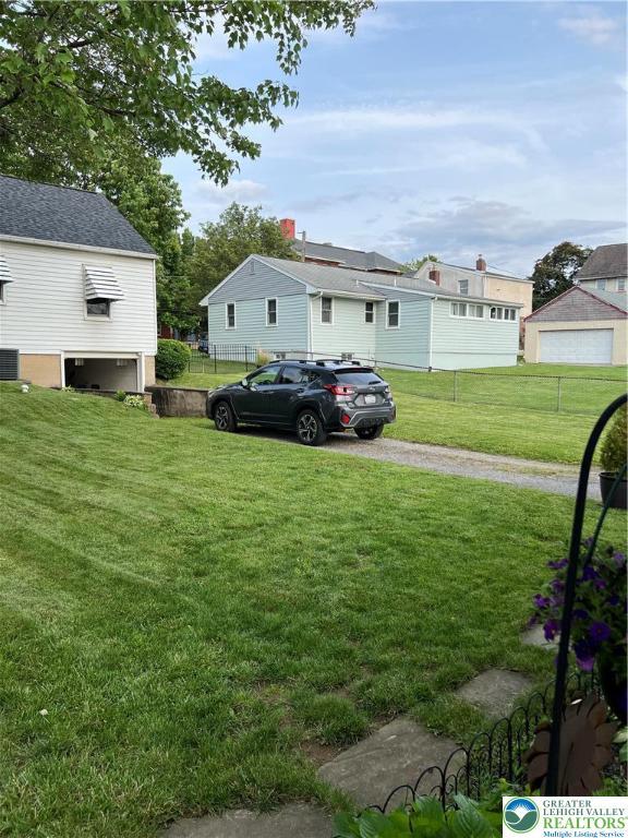 1540 Riegel St, Hellertown Borough, PA 18055 - view of yard featuring central AC and driveway