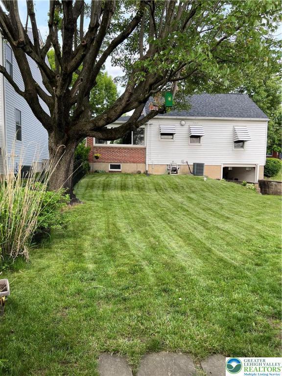 1540 Riegel St, Hellertown Borough, PA 18055 - view of grassy yard with cooling unit