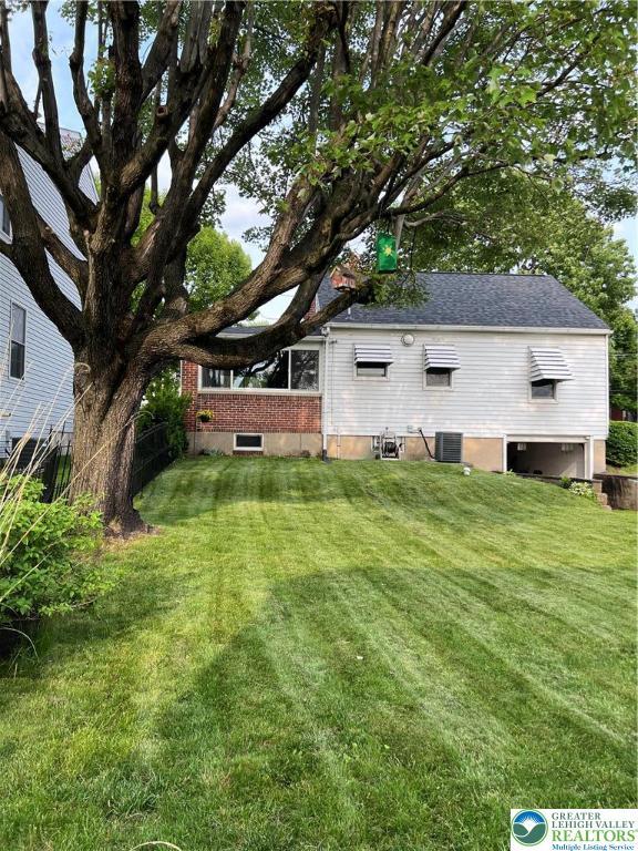 1540 Riegel St, Hellertown Borough, PA 18055 - view of green lawn with central AC unit