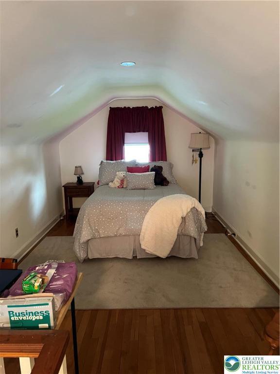 1540 Riegel St, Hellertown Borough, PA 18055 - bedroom with wood finished floors, lofted ceiling, and baseboards