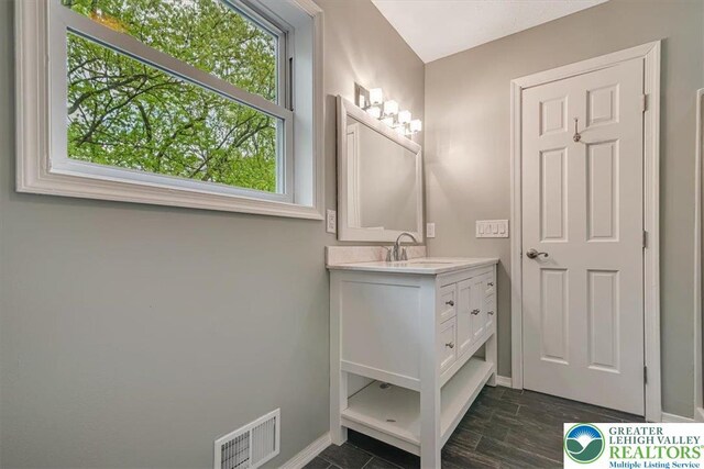 2330 Burntwood Dr, East Stroudsburg, PA 18301 - bathroom with vanity and baseboards