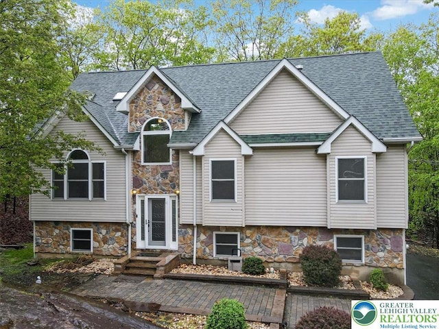 2330 Burntwood Dr, East Stroudsburg, PA 18301 - view of front of property with stone siding and a shingled roof