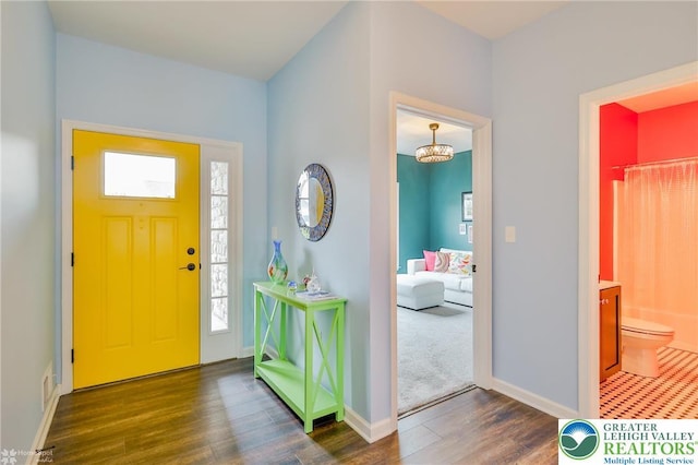 1050 Lisa Ln, Palmer Twp, PA 18045 - entrance foyer featuring wood finished floors and baseboards