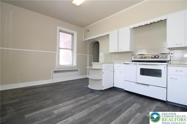 1171 E 4th St, Bethlehem City, PA 18015 - kitchen with electric range, radiator heating unit, light countertops, white cabinets, and dark wood finished floors