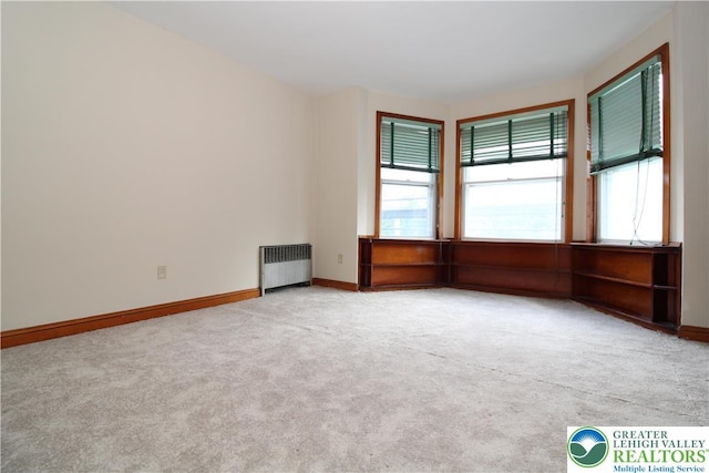 1171 E 4th St, Bethlehem City, PA 18015 - carpeted spare room with radiator heating unit and baseboards
