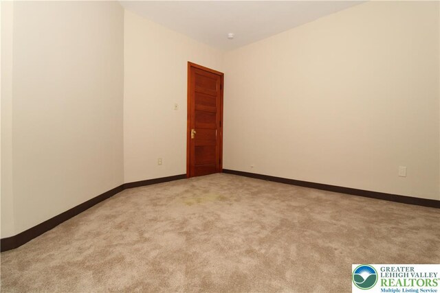 1171 E 4th St, Bethlehem City, PA 18015 - unfurnished room with light colored carpet and baseboards