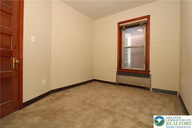 1171 E 4th St, Bethlehem City, PA 18015 - unfurnished room with radiator heating unit, carpet flooring, and baseboards