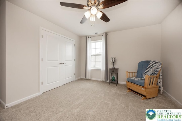 7911 Schaefer Crst, Upper Macungie Twp, PA 18031 - living area featuring carpet floors, baseboards, and ceiling fan