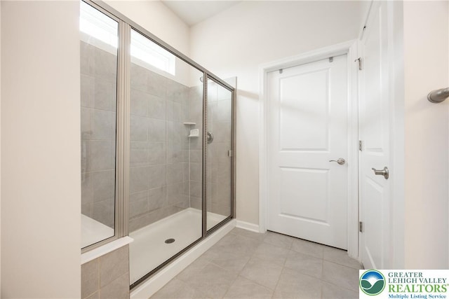7911 Schaefer Crst, Upper Macungie Twp, PA 18031 - bathroom with a stall shower, tile patterned floors, and baseboards