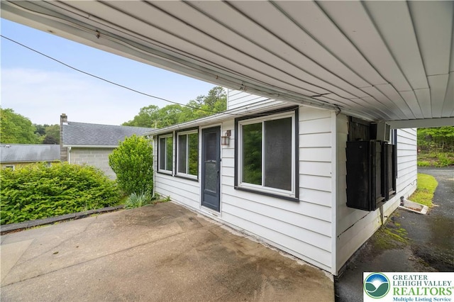 735 Beaver Run Dr, Mahoning Township, PA 18235 - view of property exterior featuring a patio