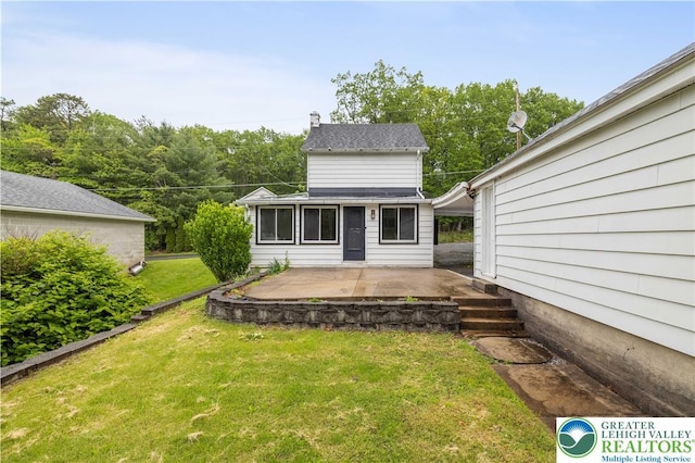 735 Beaver Run Dr, Mahoning Township, PA 18235 - rear view of house with a yard and a patio