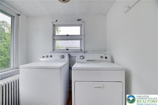 735 Beaver Run Dr, Mahoning Township, PA 18235 - laundry room with radiator heating unit, washer and clothes dryer, and plenty of natural light