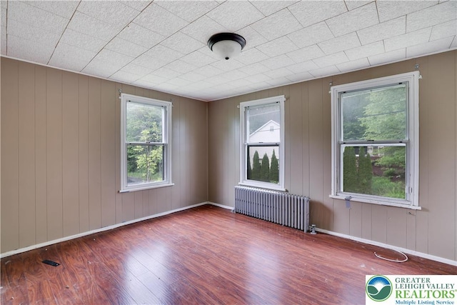 735 Beaver Run Dr, Mahoning Township, PA 18235 - spare room with radiator, wood finished floors, and baseboards
