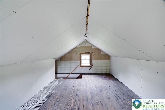 735 Beaver Run Dr, Mahoning Township, PA 18235 - bonus room featuring hardwood / wood-style flooring, lofted ceiling, and wooden walls