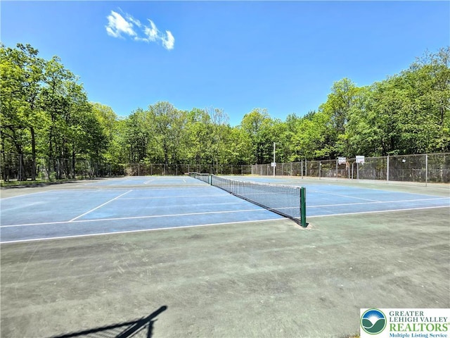 163 Piney Woods Dr, Penn Forest Twp, PA 18229 - view of tennis court featuring community basketball court