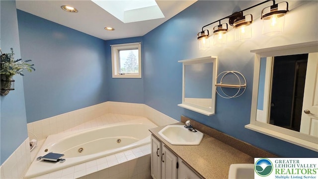 2872 Sheffield Dr, Lower Macungie Twp, PA 18049 - bathroom with a skylight, a jetted tub, double vanity, and recessed lighting
