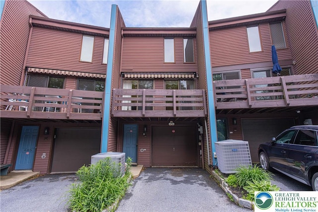 603 Main St Unit 10, Bethlehem City, PA 18018 - view of front of house with an attached garage, driveway, and central AC unit