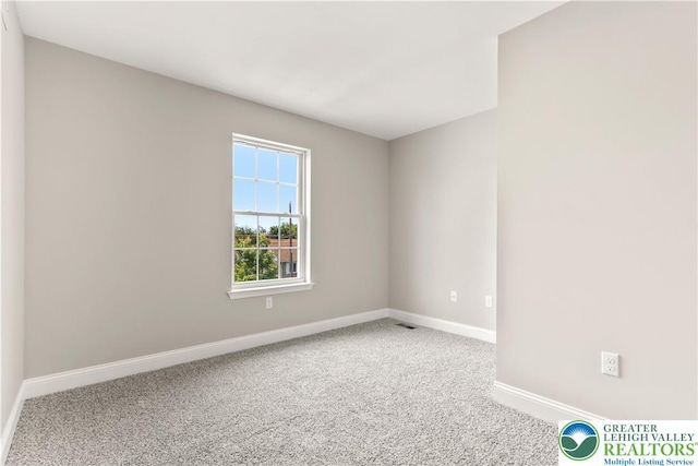 721 7th St, Whitehall Twp, PA 18052 - spare room with carpet and baseboards