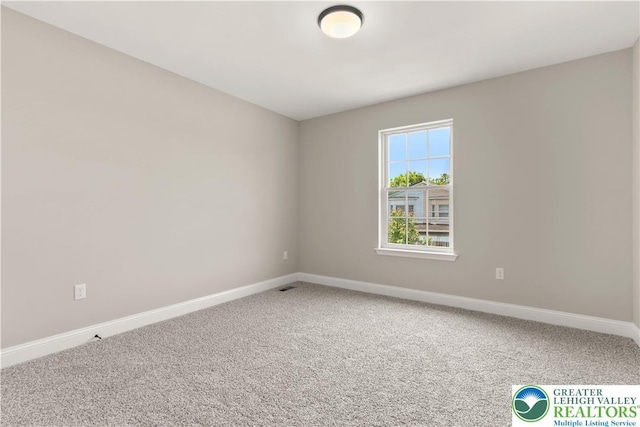 721 7th St, Whitehall Twp, PA 18052 - empty room with carpet flooring and baseboards