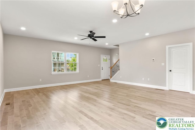 721 7th St, Whitehall Twp, PA 18052 - unfurnished living room featuring stairway, light wood-type flooring, ceiling fan, baseboards, and recessed lighting