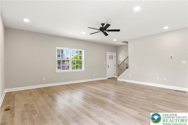 721 7th St, Whitehall Twp, PA 18052 - unfurnished living room featuring stairs, light wood-type flooring, baseboards, recessed lighting, and ceiling fan