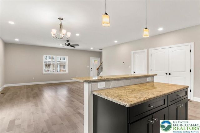 721 7th St, Whitehall Twp, PA 18052 - kitchen featuring a chandelier, baseboards, light wood finished floors, and recessed lighting