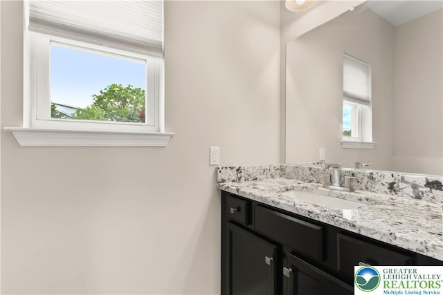 721 7th St, Whitehall Twp, PA 18052 - bathroom featuring vanity and plenty of natural light