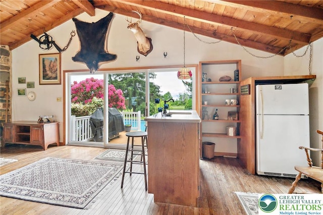 1132 Upperstump Rd, Hilltown Twp, PA 18914 - kitchen with freestanding refrigerator, wood ceiling with exposed beams, light wood-style flooring, high vaulted ceiling, and open shelves