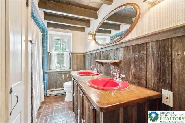 1132 Upperstump Rd, Hilltown Twp, PA 18914 - full bath with a baseboard radiator, brick flooring, wainscoting, toilet, and double vanity