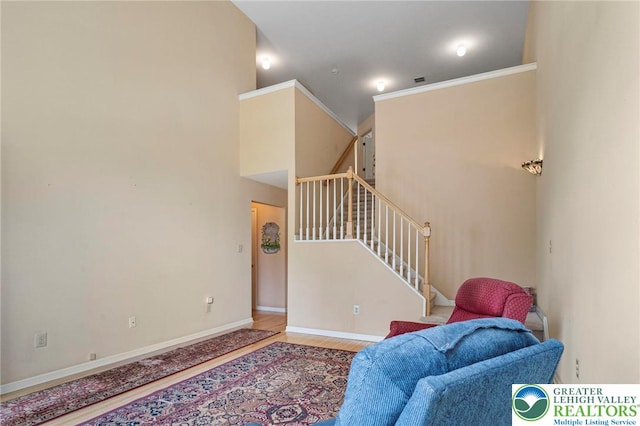 8077 Cross Creek Cir, Upper Macungie Twp, PA 18031 - living room with stairs, wood finished floors, and baseboards