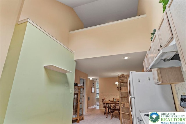 8077 Cross Creek Cir, Upper Macungie Twp, PA 18031 - kitchen with light colored carpet, white cabinets, freestanding refrigerator, recessed lighting, and light countertops