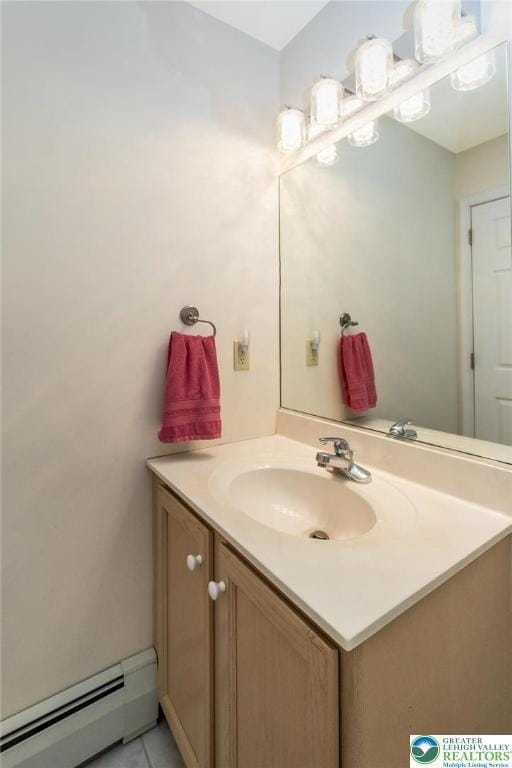 234 Venetian Dr, Forks Twp, PA 18040 - bathroom featuring a baseboard radiator, vanity, and tile patterned flooring
