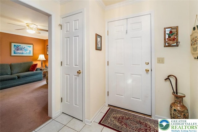 234 Venetian Dr, Forks Twp, PA 18040 - foyer with ornamental molding, light tile patterned floors, a ceiling fan, baseboards, and light carpet