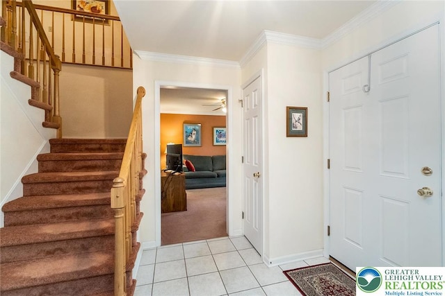 234 Venetian Dr, Forks Twp, PA 18040 - entryway with stairway, light carpet, ornamental molding, baseboards, and light tile patterned floors