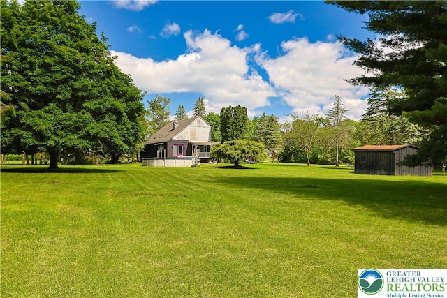 2671 Community, Moore Twp, PA 18014 - view of green lawn featuring an outdoor structure