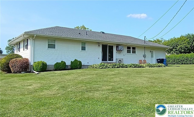 106 3rd Ave, Walnutport Borough, PA 18088 - rear view of property featuring a yard and an AC wall unit