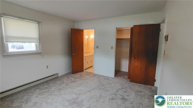 106 3rd Ave, Walnutport Borough, PA 18088 - unfurnished bedroom with a baseboard radiator, carpet flooring, and a closet