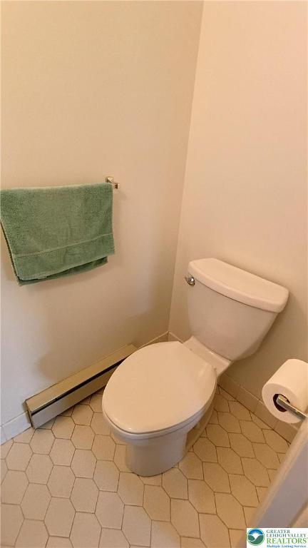106 3rd Ave, Walnutport Borough, PA 18088 - bathroom with toilet and a baseboard heating unit