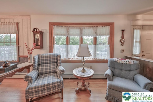 4379 Meadow Ln, South Whitehall Twp, PA 18104 - sitting room with healthy amount of natural light and wood finished floors