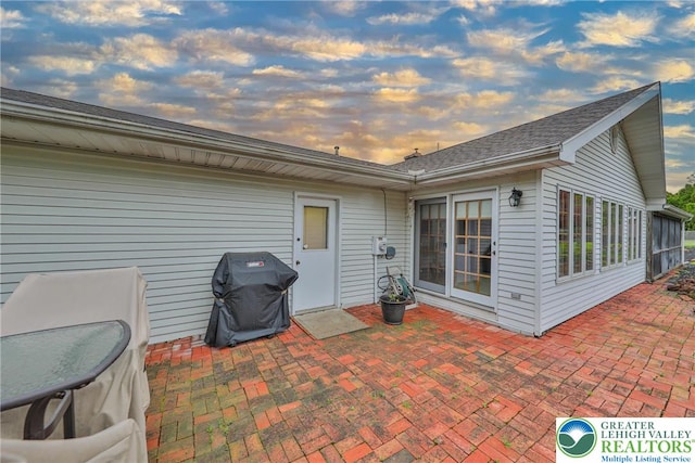 4379 Meadow Ln, South Whitehall Twp, PA 18104 - back of house at dusk featuring a patio