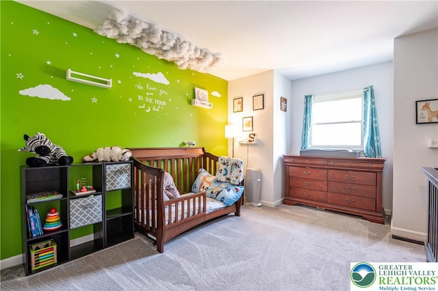 1411 Howard Ln, Palmer Twp, PA 18045 - bedroom featuring baseboards, carpet, and a nursery area