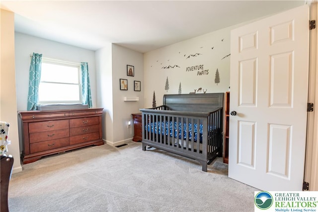 1411 Howard Ln, Palmer Twp, PA 18045 - bedroom featuring carpet, a crib, and baseboards