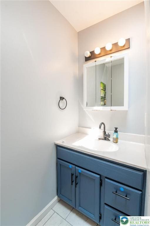 1411 Howard Ln, Palmer Twp, PA 18045 - bathroom featuring vanity, baseboards, and tile patterned flooring