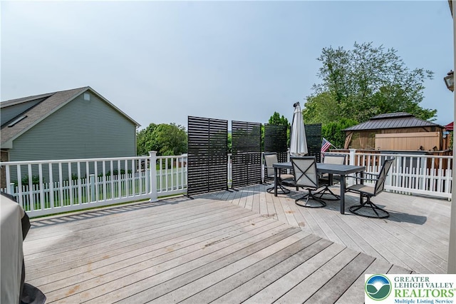 1411 Howard Ln, Palmer Twp, PA 18045 - wooden terrace featuring outdoor dining space and a gazebo