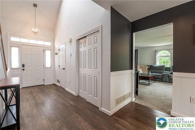 1411 Howard Ln, Palmer Twp, PA 18045 - foyer entrance featuring dark wood-style flooring and baseboards