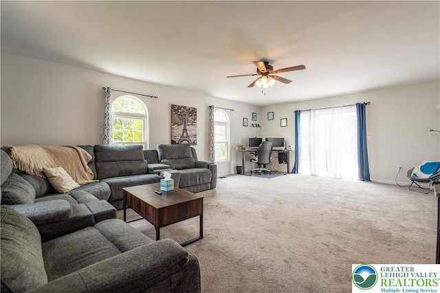 1411 Howard Ln, Palmer Twp, PA 18045 - carpeted living room featuring an office area, ceiling fan, and baseboards